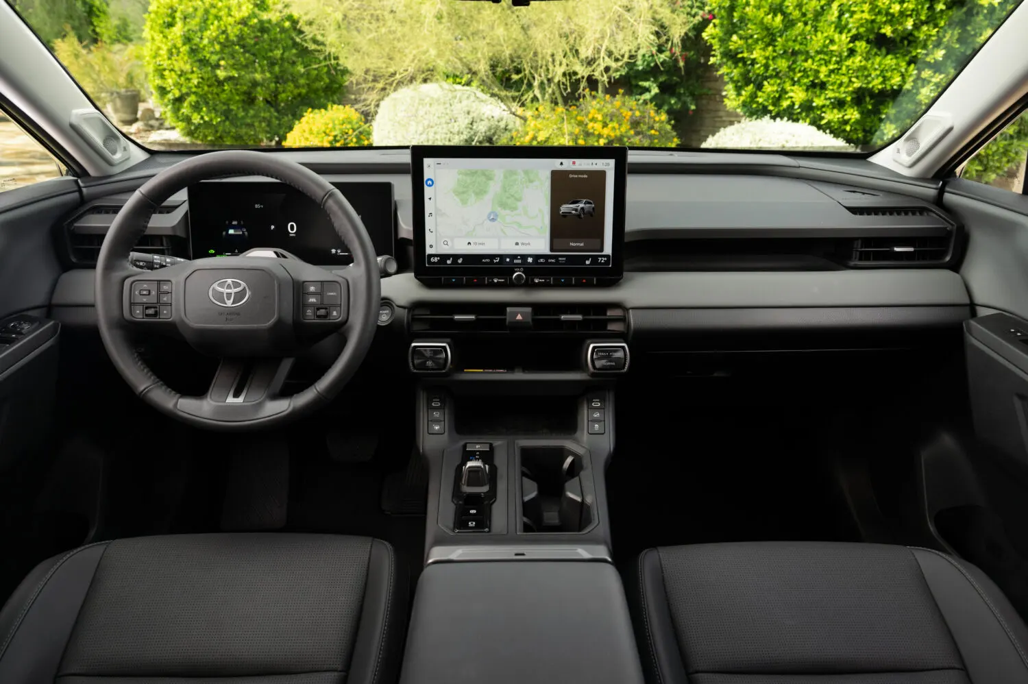 2026 Toyota RAV4 2.0L Hybrid FWD Elite — dashboard and 15.6-inch screen